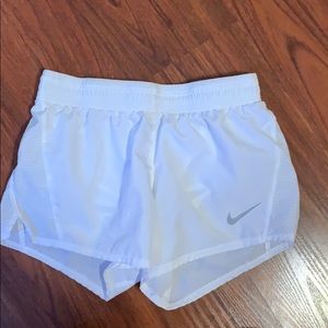 White Nike athletic shorts
